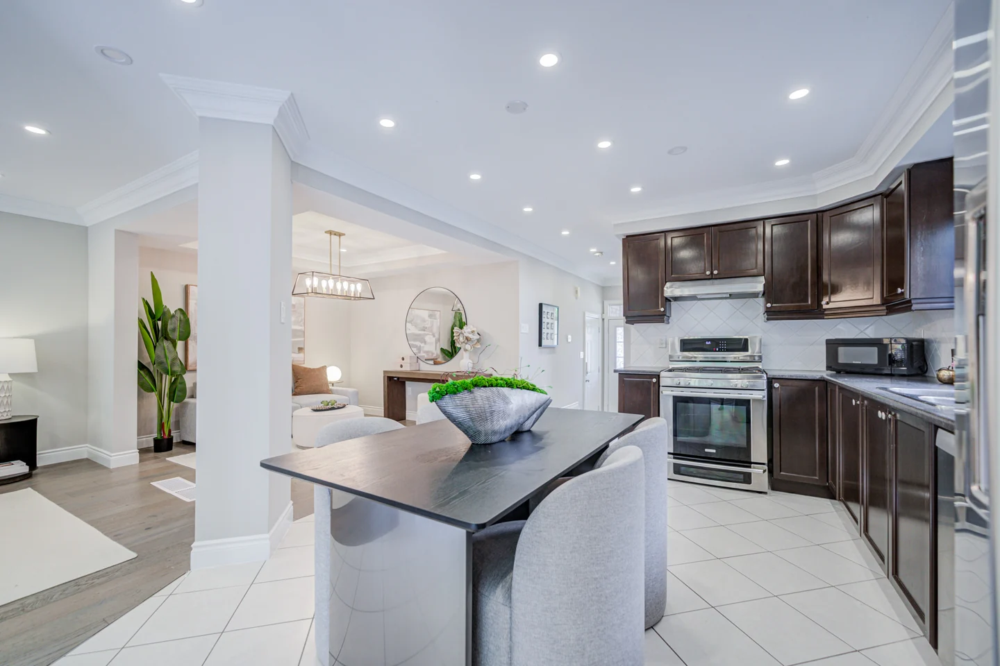 Kitchen and adjoining seating area at 30 Elmeade Lane